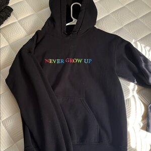 Baylen Levine Black Hoodie with Colorful 'Never Grow Up' Text